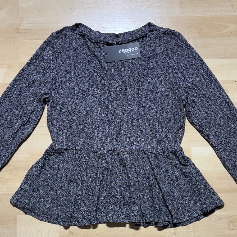 Zeagoo Women's Multicolor Peplum Blouse. Marked Large but Runs small